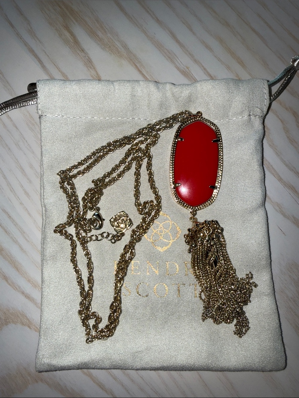 Kendra Scott Gold Necklace with Red Oval Pendant and Tassel